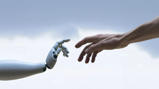 Robot hand and human hand reaching towards one another