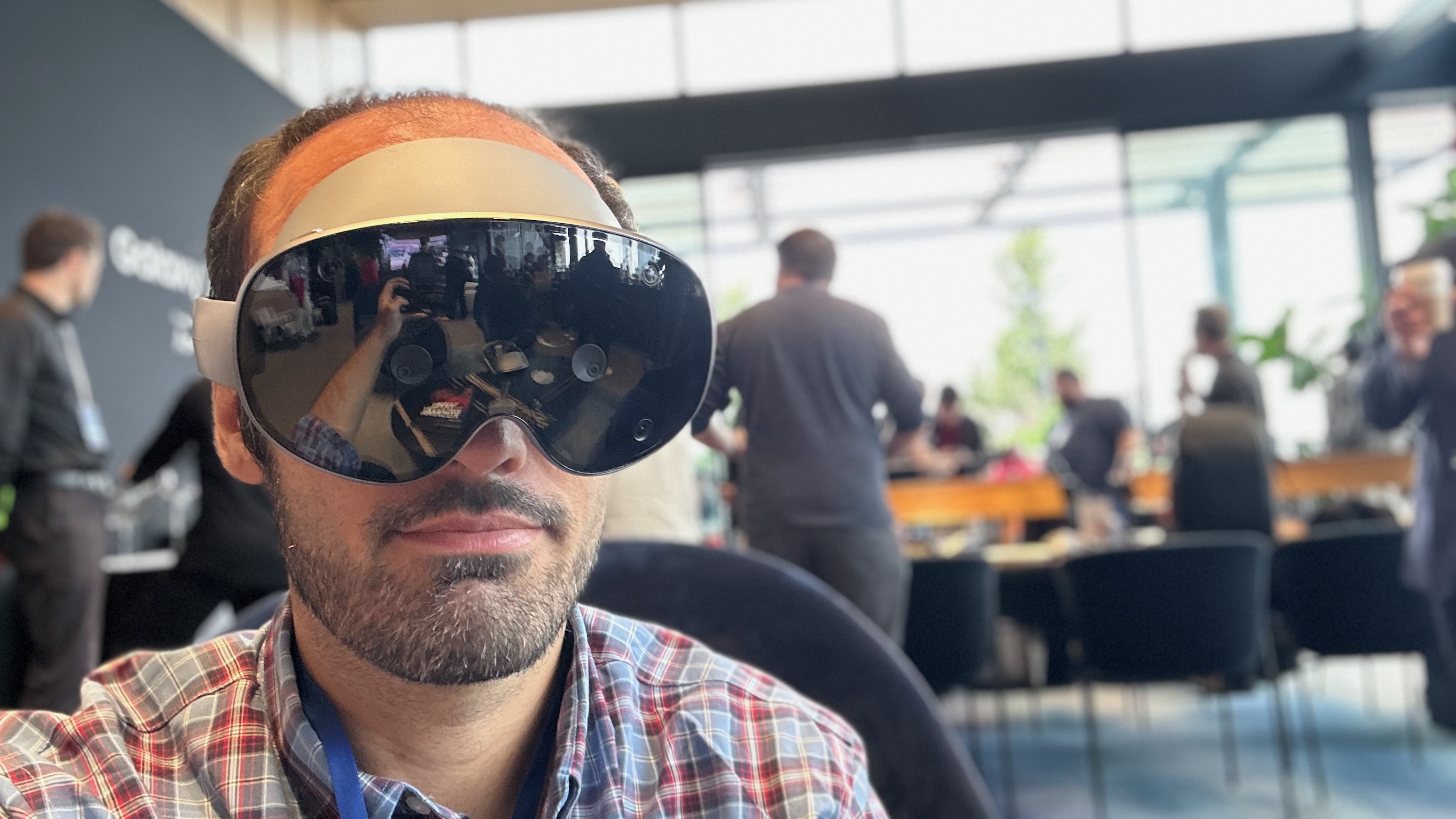 A photo of the author wearing a Samsung Galaxy XR headset.