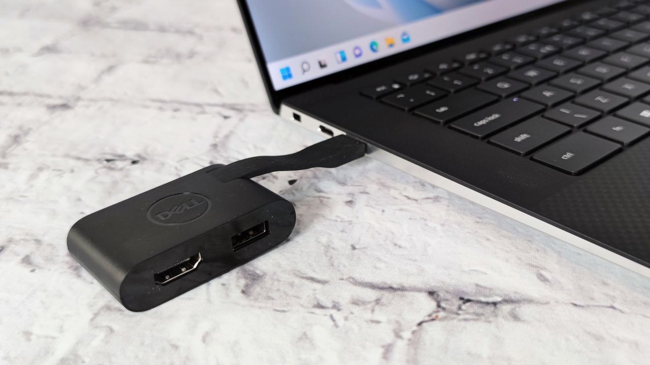 A photograph of the Dell XPS 15's bundled HDMI adapter