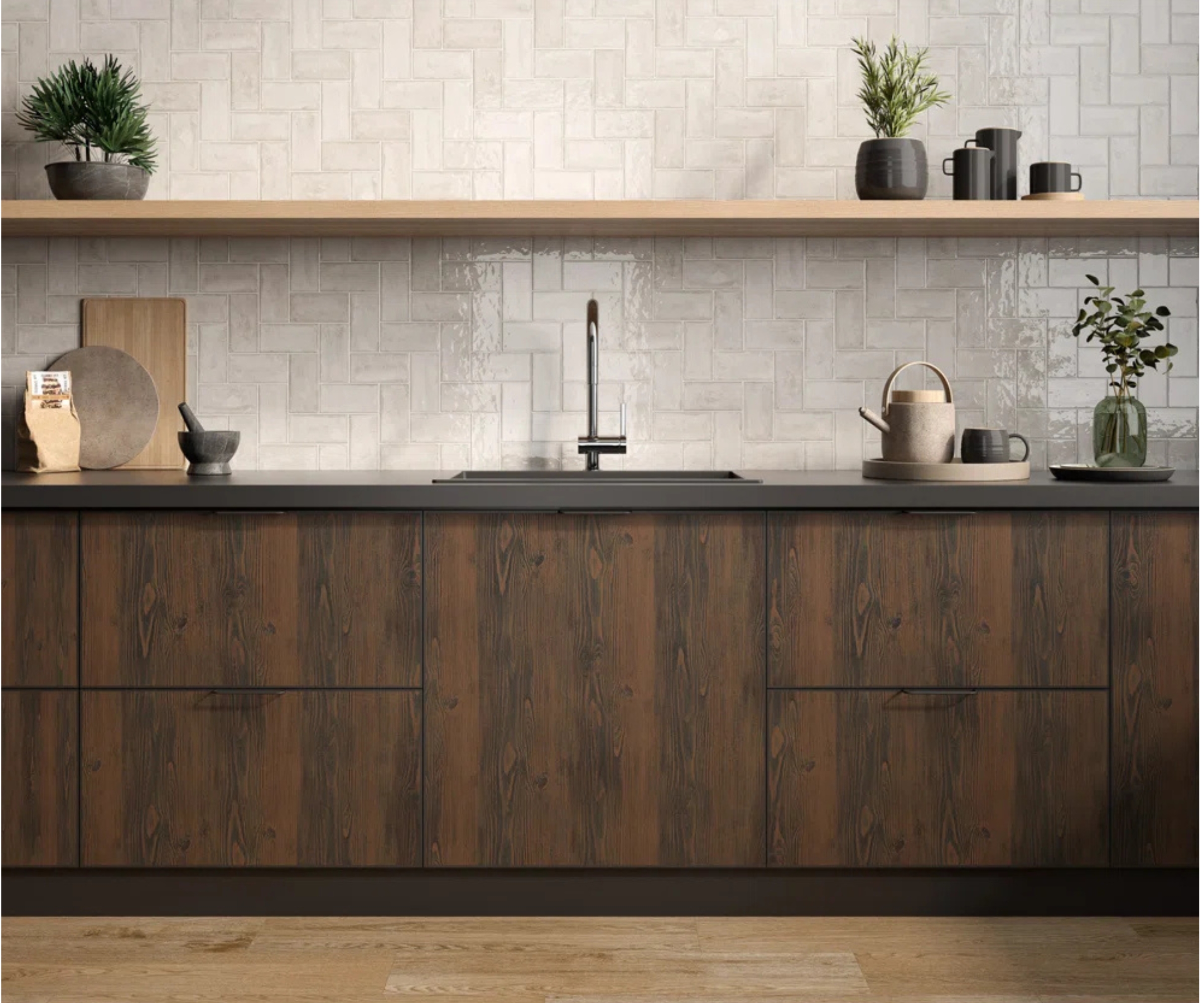 A one wall kitchen with dark wood cabinets and white wall tiles