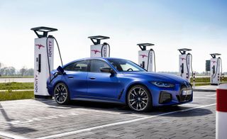 Blue BMW electric car charging up