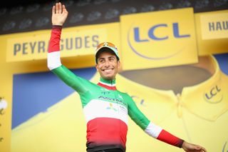 Fabio Aru on the podium to collect yellow after stage 12 at the Tour de France