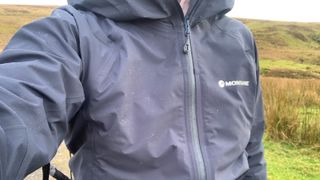 Close up of water beading on the Montane Phase Lite Waterproof Jacket