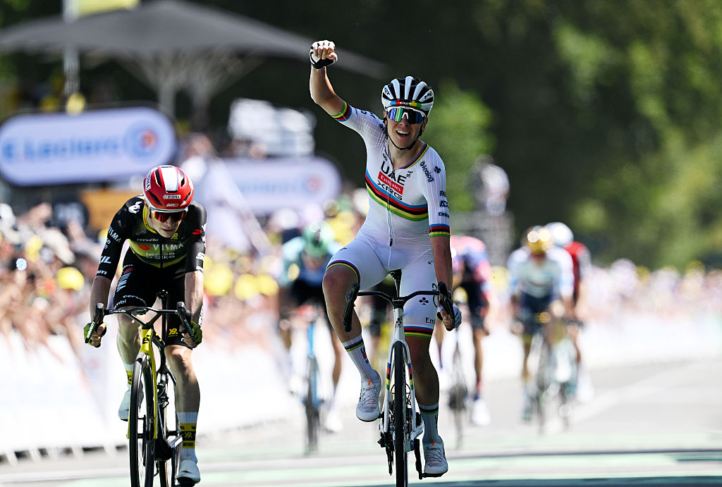 MUR-DE-BRETAGNE - GUERLEDAN, FRANCE - JULY 11: Tadej Pogacar of Slovenia and UAE Team Emirates - XRG celebrates at finish line as stage winner ahead of Jonas Vingegaard of Denmark and Team Visma | Lease a Bike (L) during the 112th Tour de France, Stage 7 a 197km stage from Saint-Malo to Mur-de-Bretagne (Guerledan) / #UCIWT / on July 11, 2025 in Saint-Malo, France. (Photo by Tim de Waele/Getty Images)