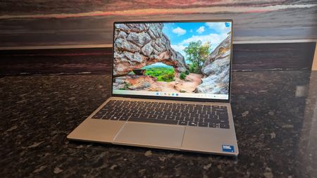 The Dell XPS 13 (2026) laptop pictured on a black marble worktop.