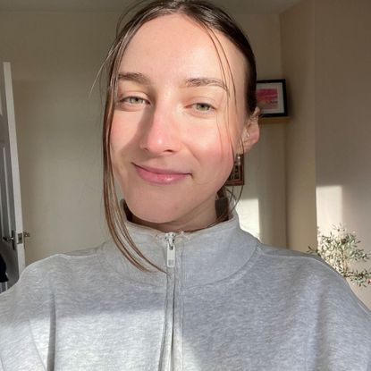 Health writer Katie Sims trying frog presses, the raved about Pilates move, from home