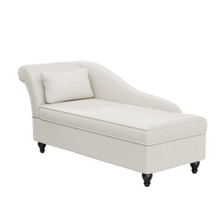 A cream chaise longue with a pillow