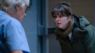 Cora McLean (ANNE KIDD);DI ‘Tosh’ McIntosh (ALISON O’DONNELL) looking scared as she looks at Ellen's body in Shetland season 8