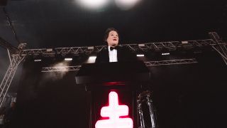 President on stage at Download