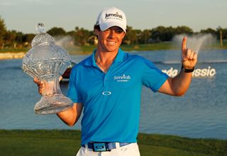 Rory McIlroy holds the trophy after winning the 2012 Honda Classic