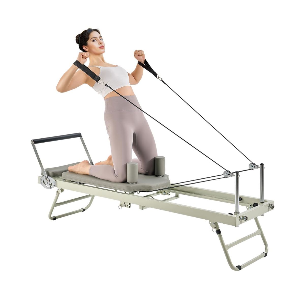 Best at home Reformer Pilates machines: A woman on a Reformer