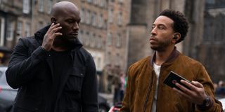 Tyrese as Roman and Ludacris as Tej prepping for a heist in F9