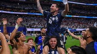 Lionel Messi of Argentina and teammates celebrate after the 2-1 win during the FIFA World Cup 2026 Semi Final match between England and Argentina at Atlanta Stadium.
