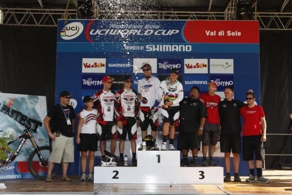 The Trek World Racing team celebrates on the podium