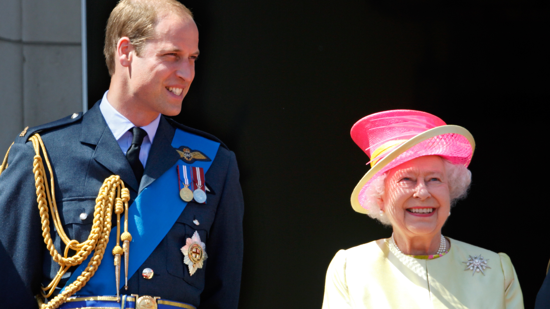 Prince William poses with Queen Elizabeth on Buckingham Palace balcony