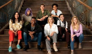 Marvel's Runaways the gang sits for a photo on some stairs