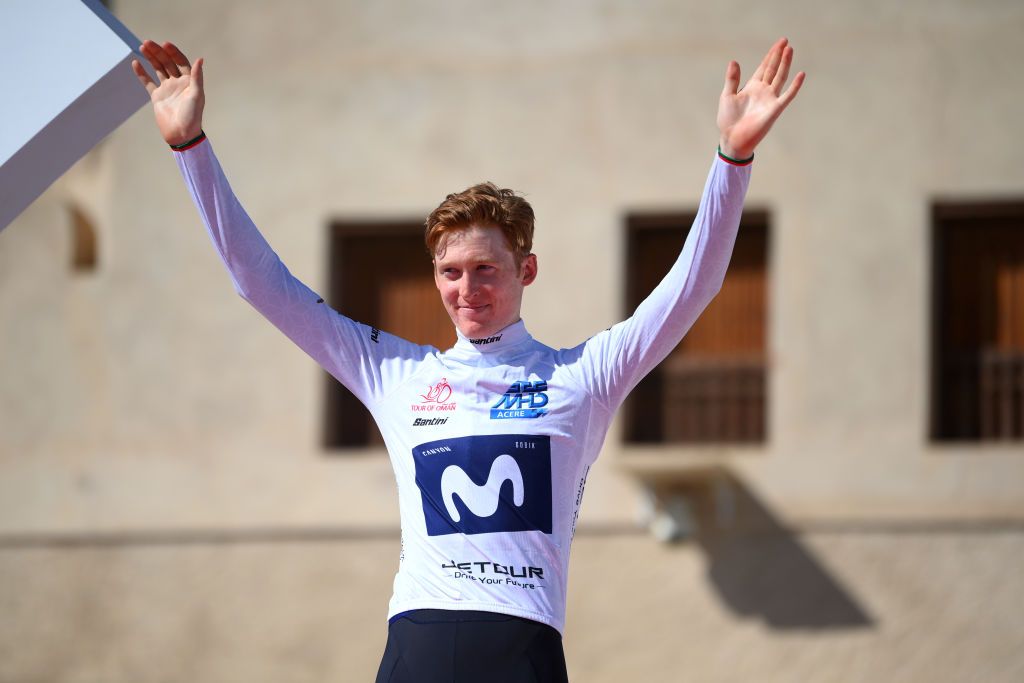 JABAL AL AKHDHAR OMAN FEBRUARY 15 Matteo Jorgenson of The United States and Movistar Team celebrates at podium as White Best Young Rider Jersey winner during the 12th Tour of Oman 2023 Stage 5 a 1522km from Samail to Jabal Al Akhdhar 1214m TourofOman on February 15 2023 in Jabal Al Akhdhar Oman Photo by Alex BroadwayGetty Images