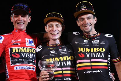 Sepp Kuss, Jonas Vingegaard and Primoz Roglič after the Vuelta a Espańa 2023