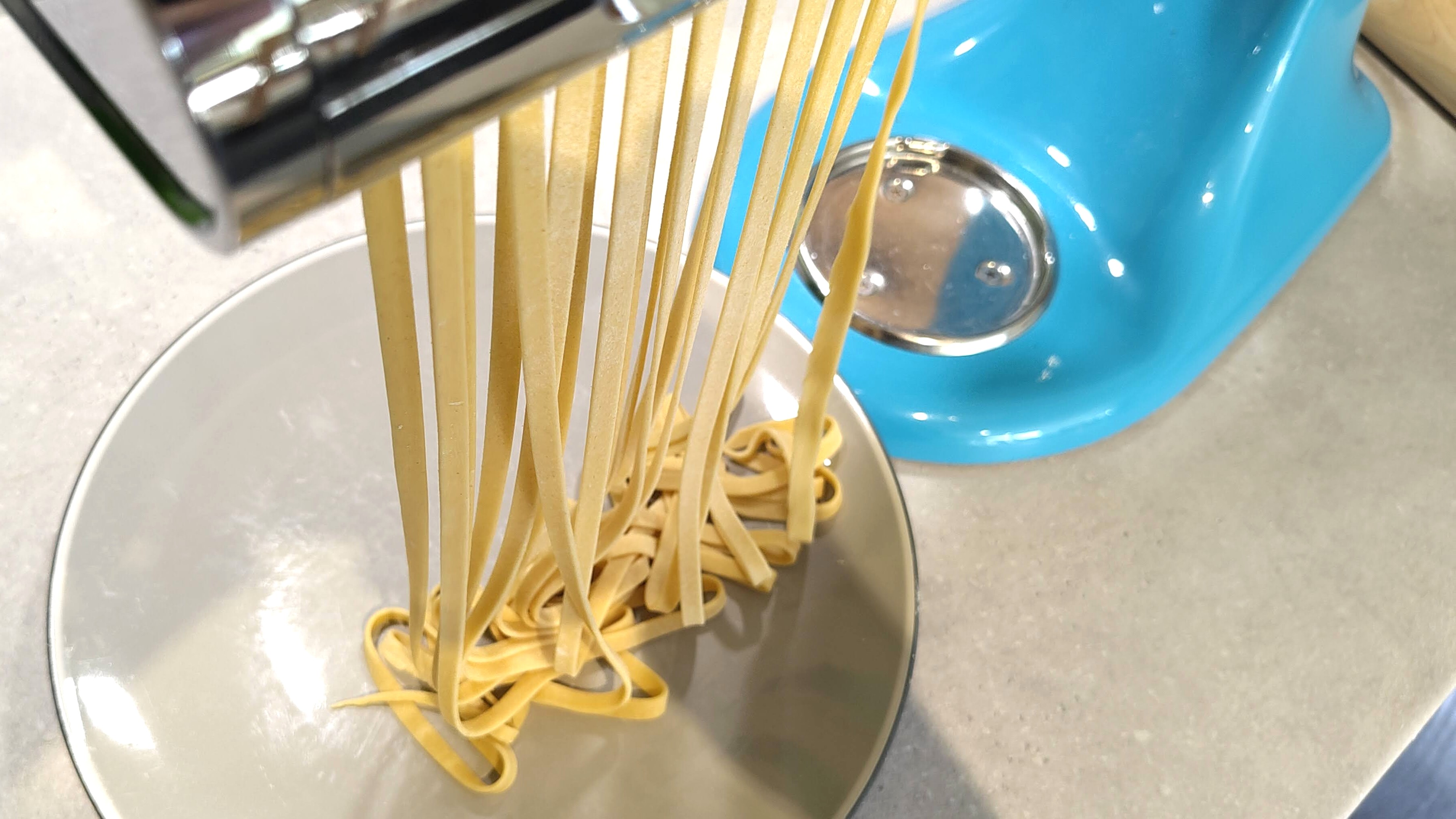 KitchenAid pasta roller attachment cutting tagliatelle