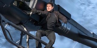 Tom Cruise as Ethan Hunt on helicopter in Mission: Impossible - Fallout