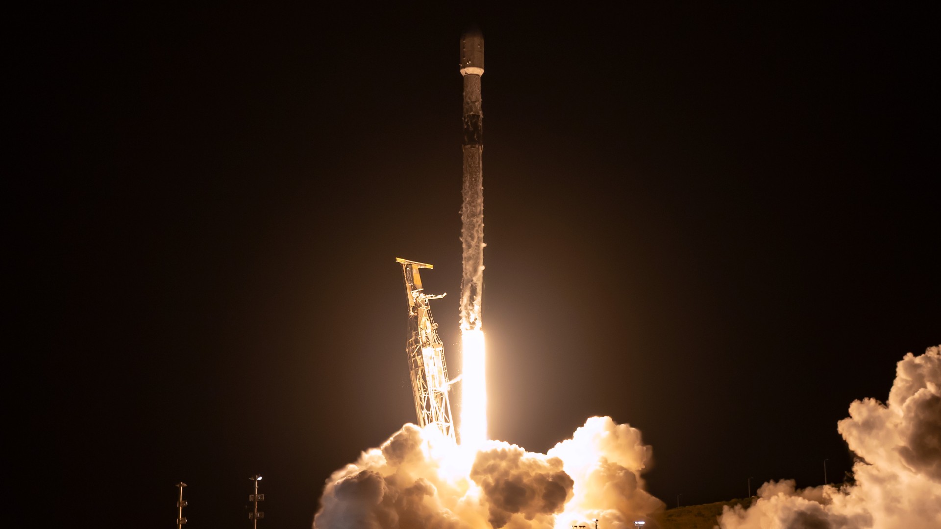 a rocket launches at night