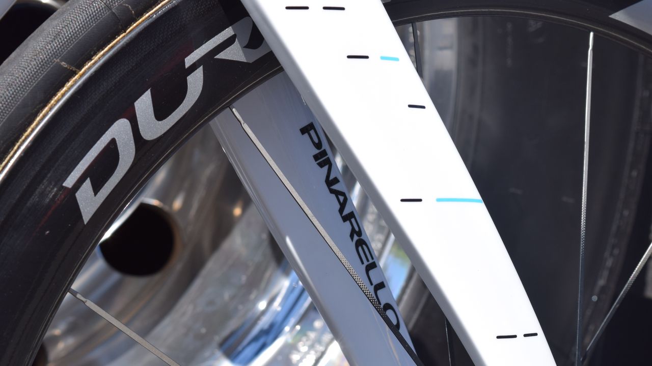 Pinarello and Shimano decals are scattered around the frameset