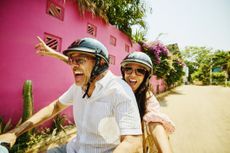 Happy couple on a bike