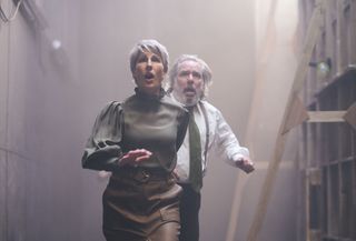 Lady Capulet (Tamsin Greig) and Lord Capulet (Lloyd Hutchinson) look on in horror