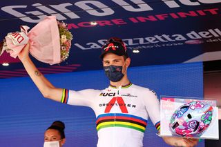 Team Ineos rider Italys Filippo Ganna celebrates on the podium after winning the 21st and last stage of the Giro dItalia 2021 cycling race a 303km individual time trial between Senago and Milan on May 30 2021 Photo by Luca Bettini AFP Photo by LUCA BETTINIAFP via Getty Images