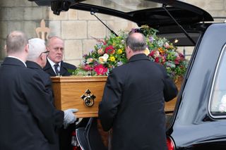 A hearse carrying the coffin of Coronation Street actress Liz Dawn, arrives at Salford Cathedral for her funeral service