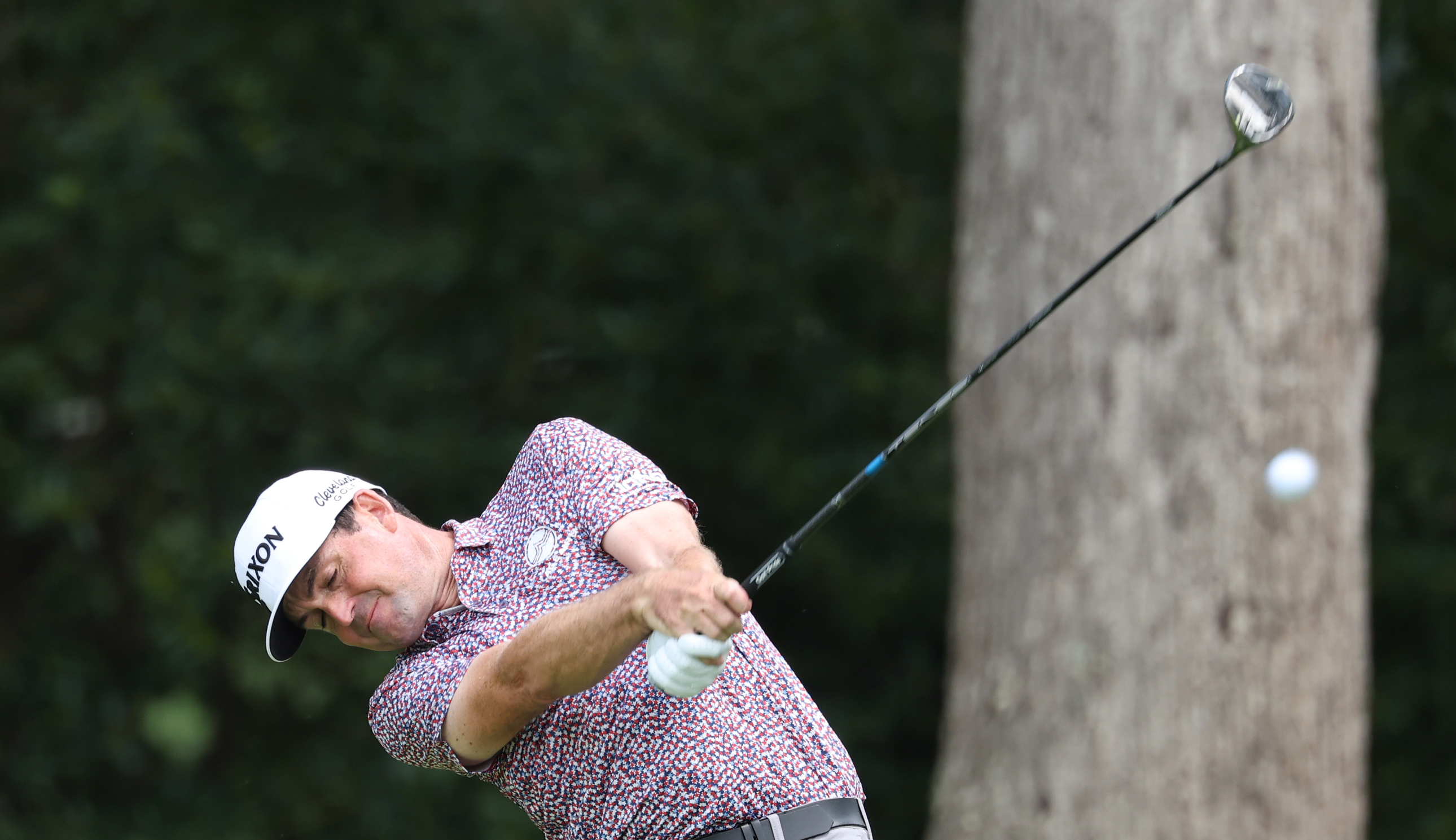 Keegan Bradley hits a fairway wood