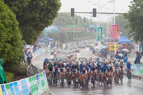 The peloton in action during a wet opening day of racing.