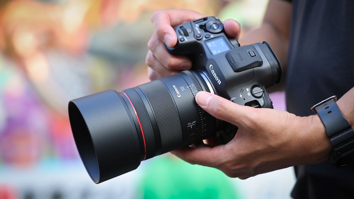 Canon RF 50mm f/1.4L VCM lens mounted to a Canon EOS R5 Mark II against a colorful background