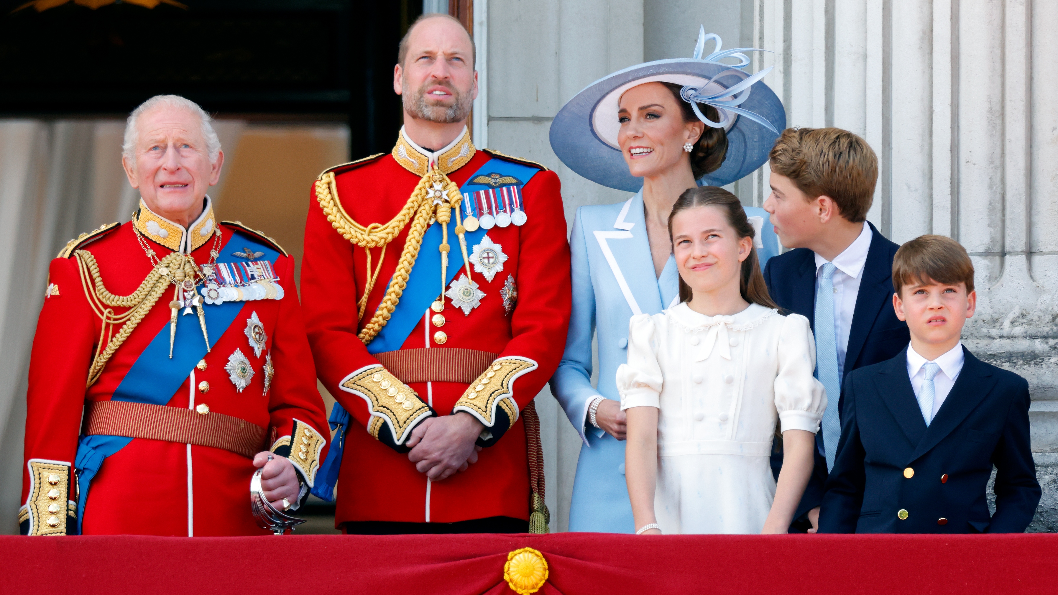 King Charles, Prince William, Catherine, Princess of Wales, Princess Charlotte, Prince George and Prince Louis watch an RAF flypast from the balcony of Buckingham Palace on June 13, 2026