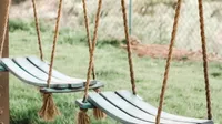 WildflowerByHeather Wildflower Wine Barrel Rope Swing | £173.83 at Etsy