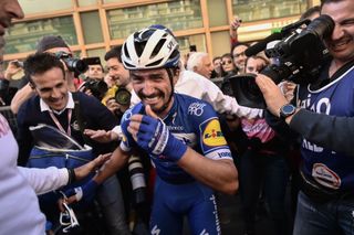 Julian Alaphilippe comes to the realisation that he's won Milan-San Remo