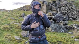 Advnture writer Matt Jones zipping up his down jacket