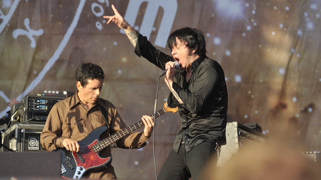 Juan Alderete and Cedric Bixler-Zavala (R) of Mars Volta perform live on stage at Sonisphere Festival on July 9, 2011.