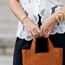 Rosewater Nails Sonia Lyson with orange bag and rosewater nails