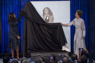 Amy Sherald and Michelle Obama with presidential portrait