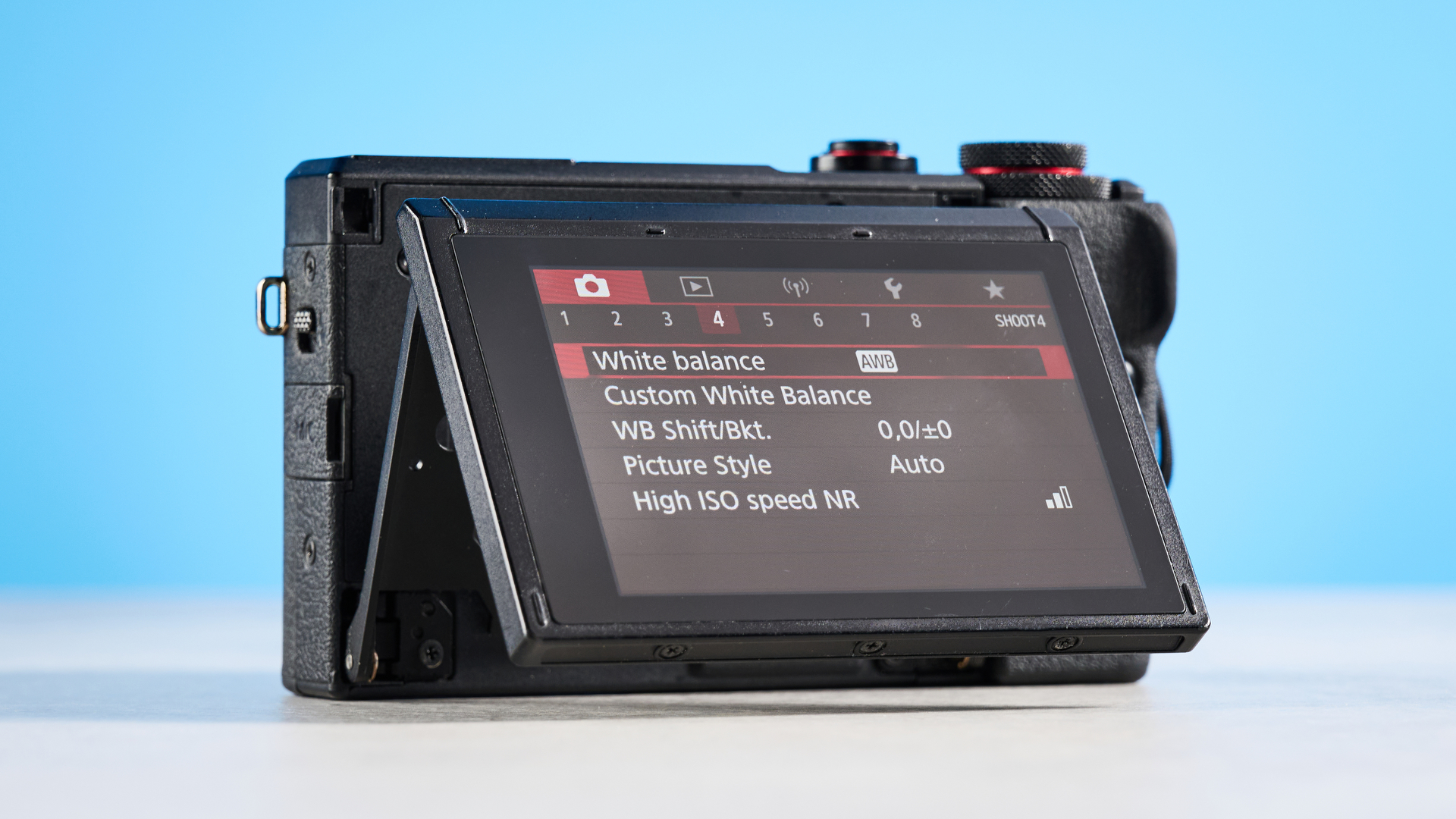 A black Canon PowerShot G7 X Mark III compact camera