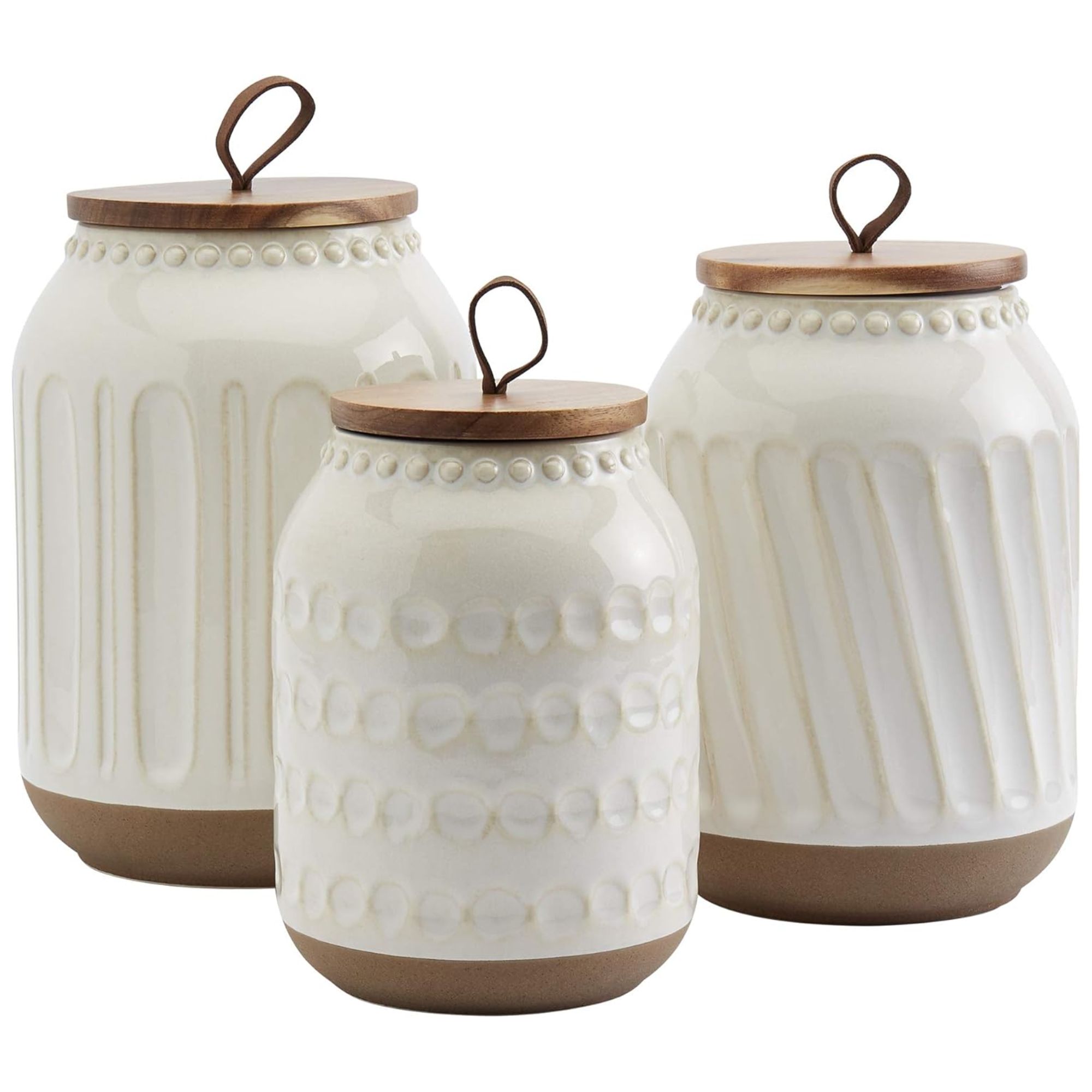 White ceramic kitchen food jars with wooden lids