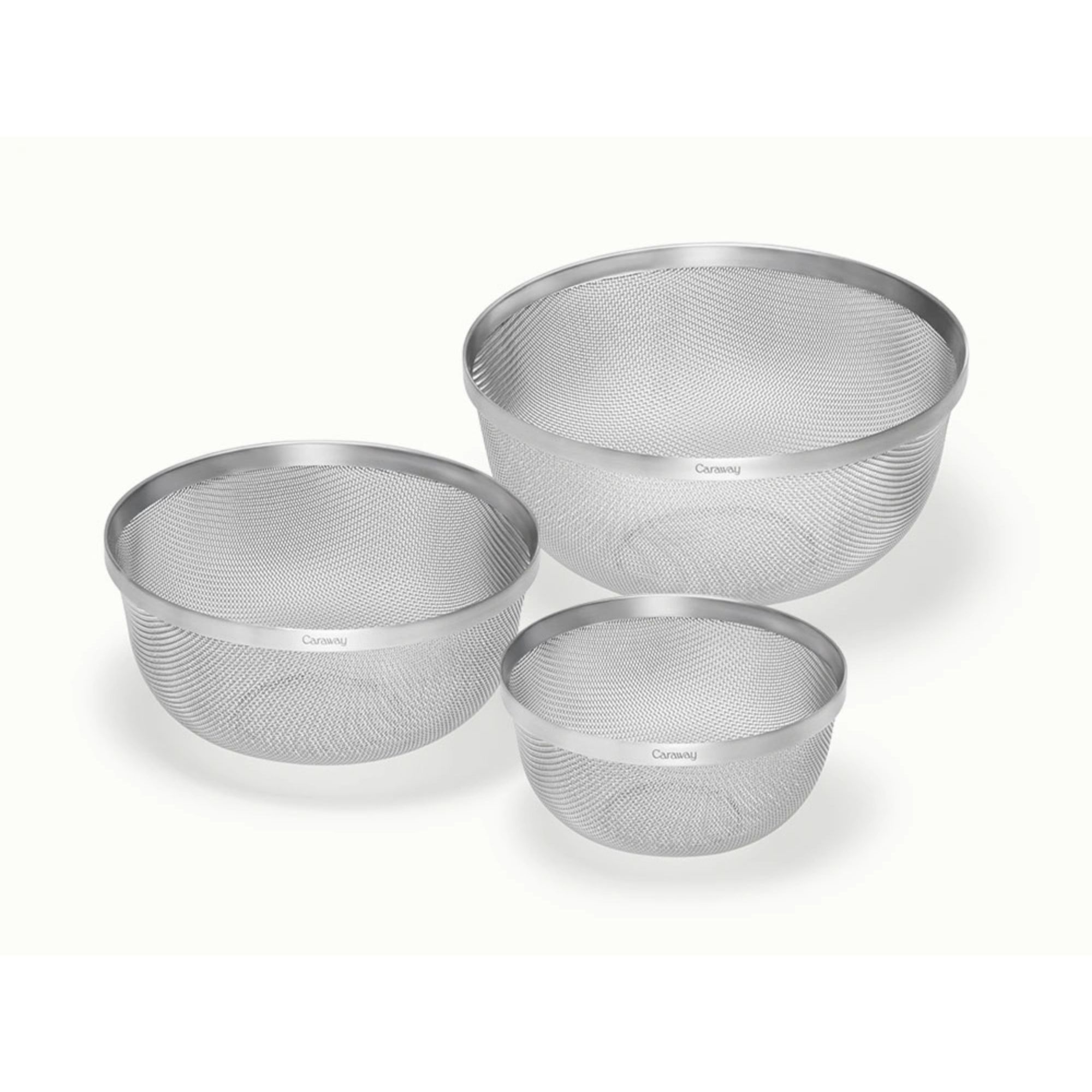 A set of three varying sized stainless steel strainers