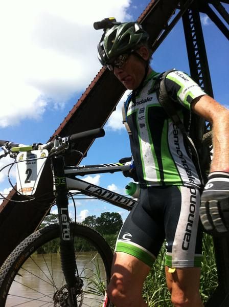 Alex Grant (Cannondale) concentrates on the railroad bridge