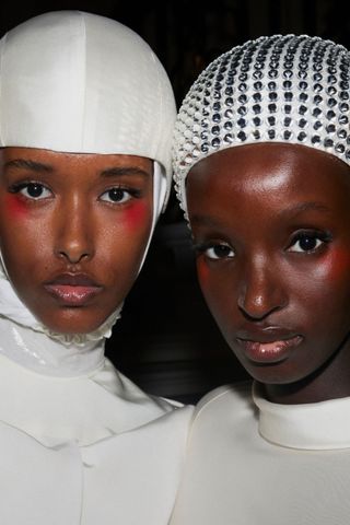 Models at SABIRAH SS25 wearing statement blusher, a key Spring/Summer 2025 fashion month beauty look