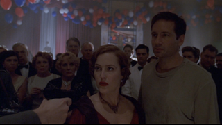 1930s Scully and Mulder in the "Triangle" episode of The X-Files