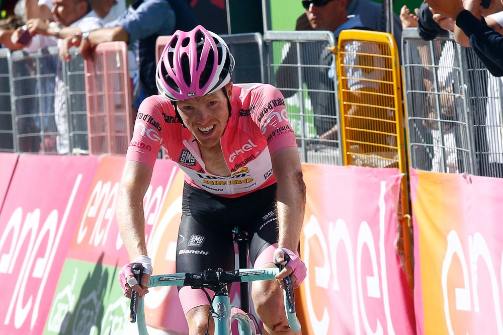 Steven Kruijswijk struggles to the line after crashing during stage 19.
