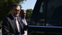 Intel CEO Lip Bu-Tan getting into a vehicle.