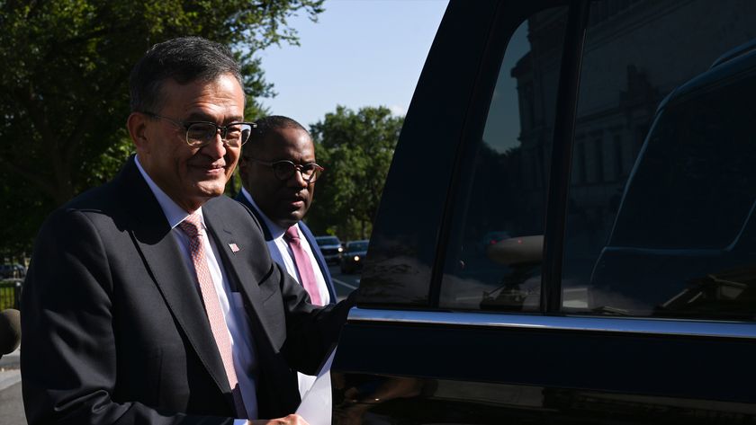 Intel CEO Lip Bu-Tan getting into a vehicle.