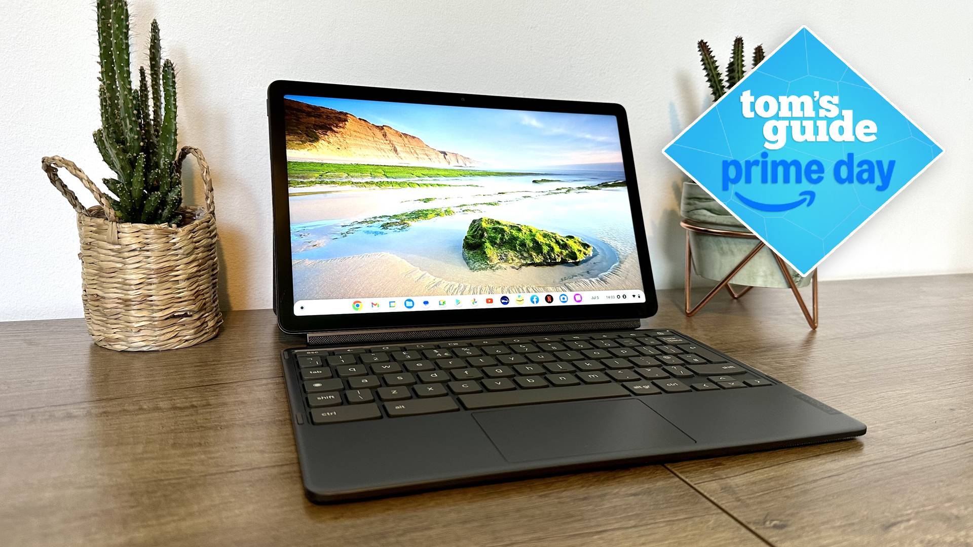 Lenovo Chromebook on table with Tom's Guide Prime Day badge